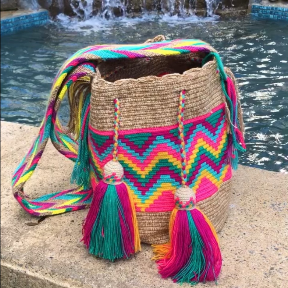 Authentic handmade Wayuu bag. Tan color and colorful decoration…